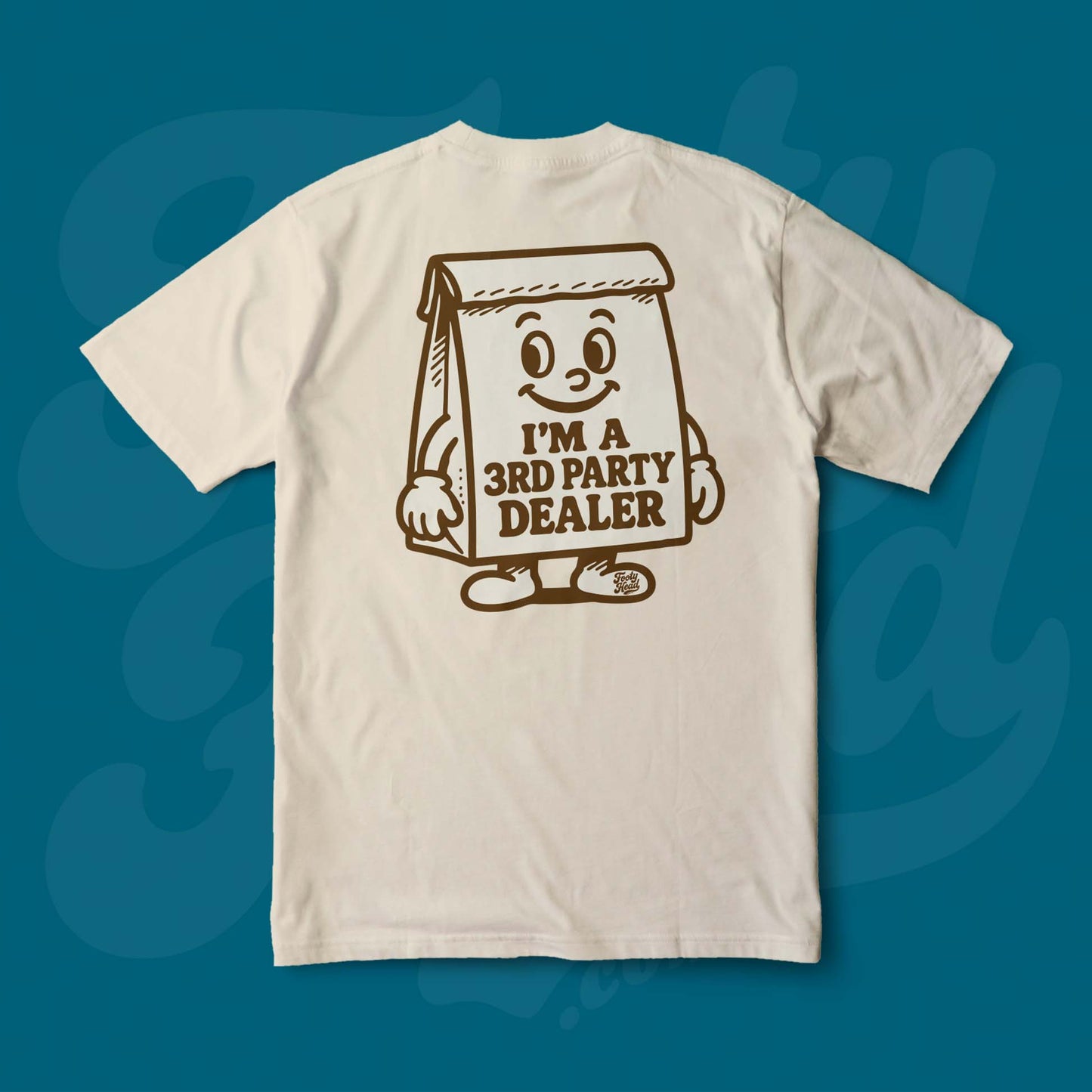 The 3rd Party Dealer Footy Head T-Shirt, brown paper bag. Sand Colour.
